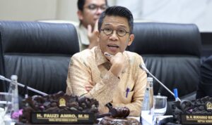 Ketua_Komisi_XI_DPR_RI_Mukhamad_Misbakhun__saat_memimpin_Rapat_Dengar_Pendapat__RDP__Komisi_XI_DPR_R20260526081734